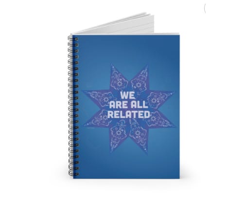 Notebook with We Are All Related illustration